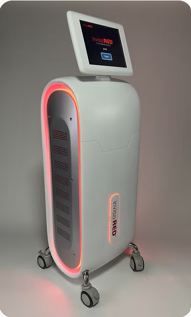 The InvisaRed body contouring device, a white upright unit with a red-lit treatment panel and a touchscreen
